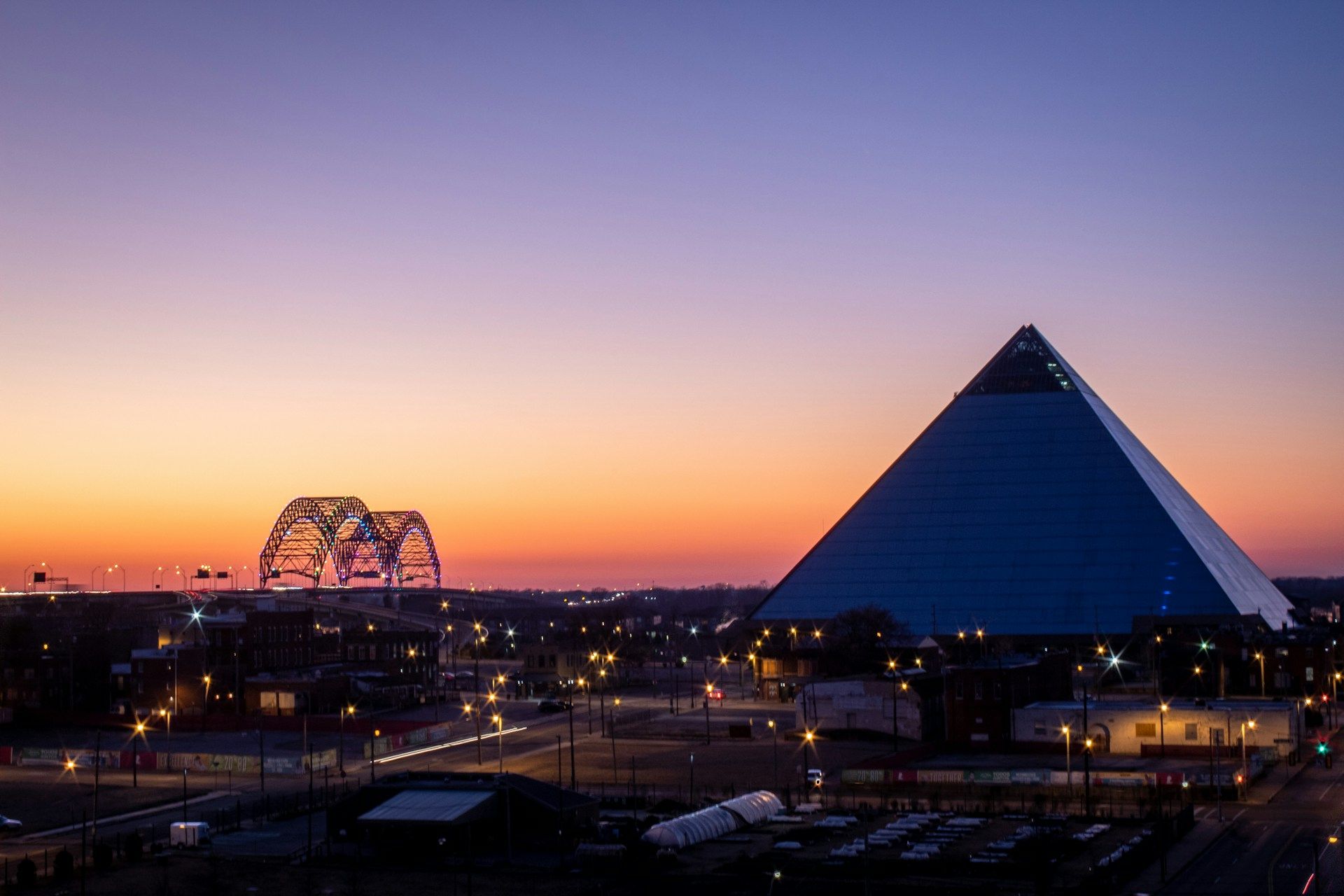 Sunset over pyramid and ferris wheel Memphis
