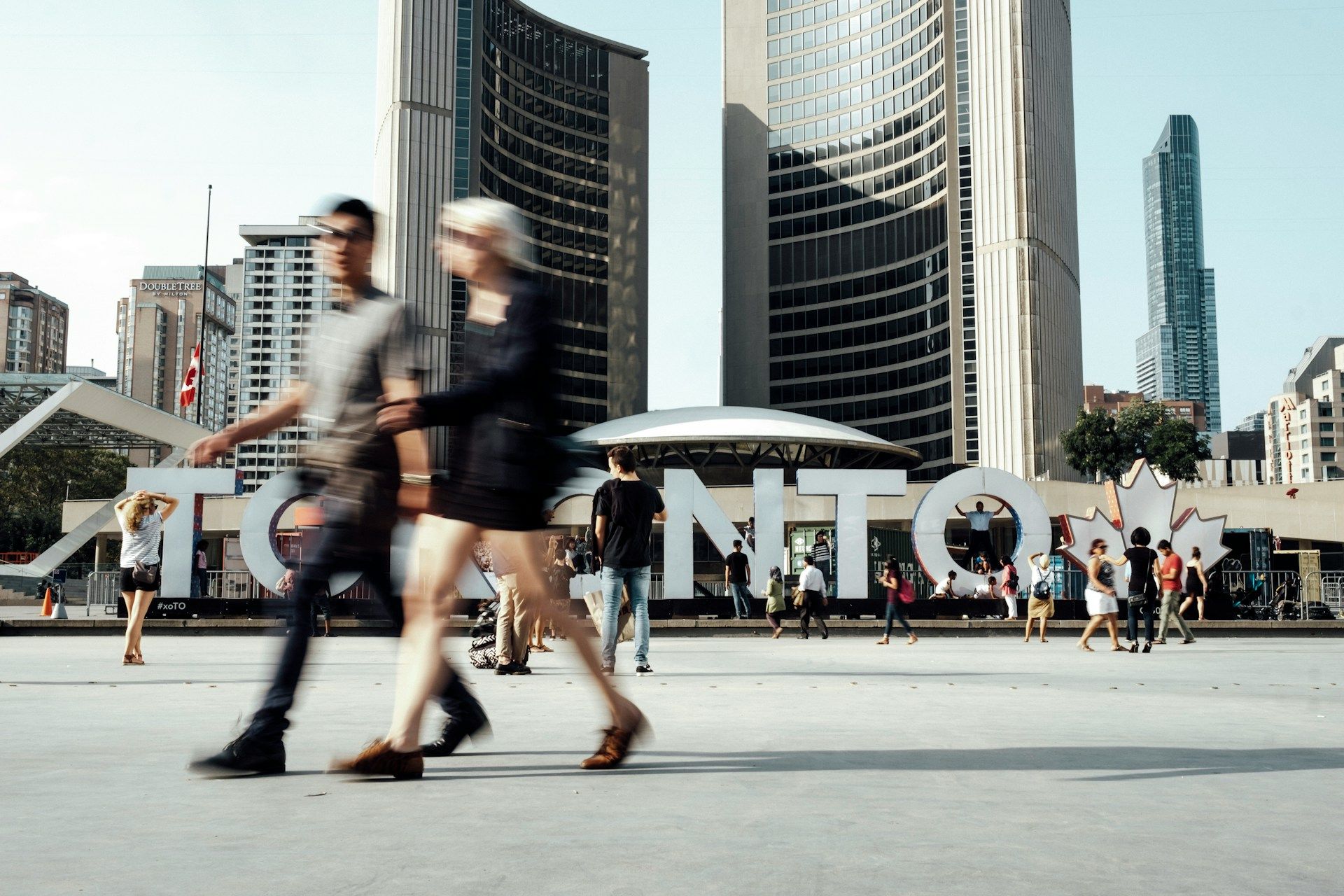 Two people walking in Toronto ON