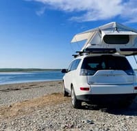 Olly the Outlander and Theo the Thule Popup Tent