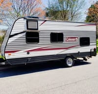 "NO LIMITS"  COLEMAN LANTERN. Easy tow! Perfect size for a small family.
