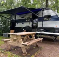 Clean and Cozy Cherokee Wolf Pup Travel Trailer