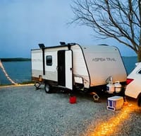 The "Campventure Cruiser"! Load up your family of six and embark on unforgettable adventures with this Dutchman travel trailer in tow.
