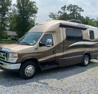 Goldy  A 2015 Coach House Platinum w/2 slideouts!
