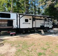 New 2022 Grand Design Imagine, fireplace, fully stocked, outdoor kitchen!