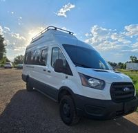 Custom Ford Transit- Pop Top bedroom, full bathroom & fridge!