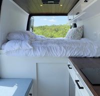 The Amazon Van! Full amenities w/storage, outdoor shower & AC!