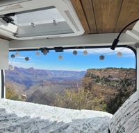 Cozy custom crafted van with Shower, Toilet, A/C , Heat, Solar and more!