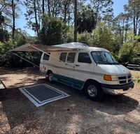 Cozy Roadtrek camper van for your next adventure!