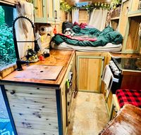 Enchanting Cabin on Wheels for Romantic Woodsy Campouts