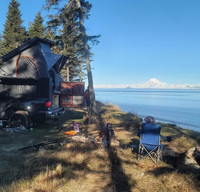 Start your Alaskan Adventure in a Toyota tacoma w/Alu-Cab Canopy Camper!