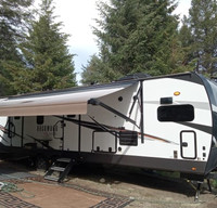 Gordon's 2021 Forest River Rockwood Signature top of line unit, king bed,