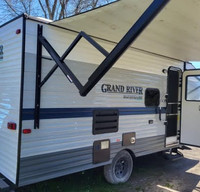 Venture in our Like New 2020 Grand River Bunkhouse Travel Trailer