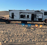 Luxury Adventure time | 2020 Genesis 5th Wheel Toyhauler with deck patio