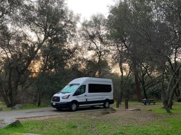 "Very versatile van" -  Rv style rig high roof up to 11 passenger.