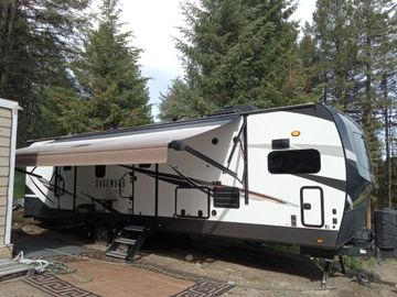 Gordon's 2021 Forest River Rockwood Signature top of line unit, king bed,