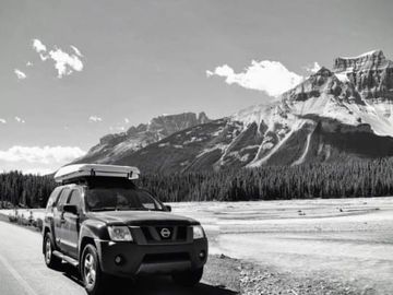 2007 Nissan Xterra with pop up tent