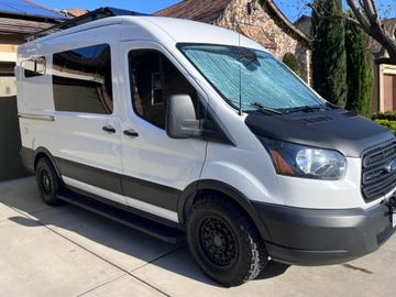 Perfectly Cozy Pet Friendly Off-grid capable 2019 Ford Transit Camper-Van