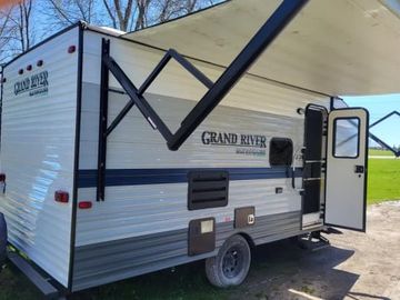 Venture in our Like New 2020 Grand River Bunkhouse Travel Trailer