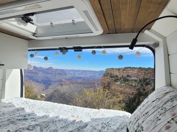 Cozy custom crafted van with Shower, Toilet, A/C , Heat, Solar and more!