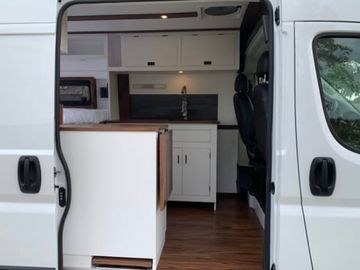 Great Pet-Friendly Camper Van with blackout shades + Paddle Board+ Hammock!