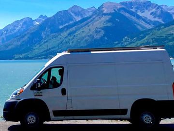 Farley | Cozy Dodge Ram Camper for 2 — Solar, Toilet, Roof Deck!