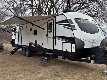2021 Dutchman Astoria family camper lots of space with private bunk room.