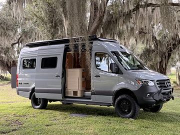 "Nellie" | 2026 AWD Noovo Next Camper Van Rental in Orlando, Florida