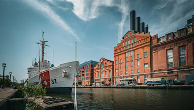 Large boat beside building in Baltimore