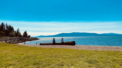 Two people on bench in Bellingham WA