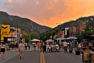 Group walking on Boulder street