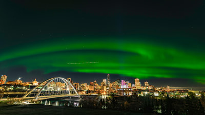 Green aurora over Edmonton at night