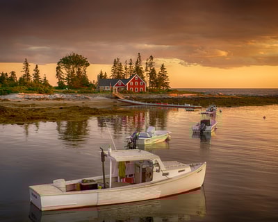 Red house in Maine by water