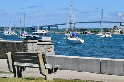 Wooden bench near cement wall Rhode Island