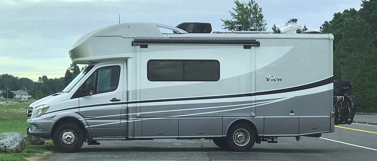 A gray and white Class B+ View motorhome