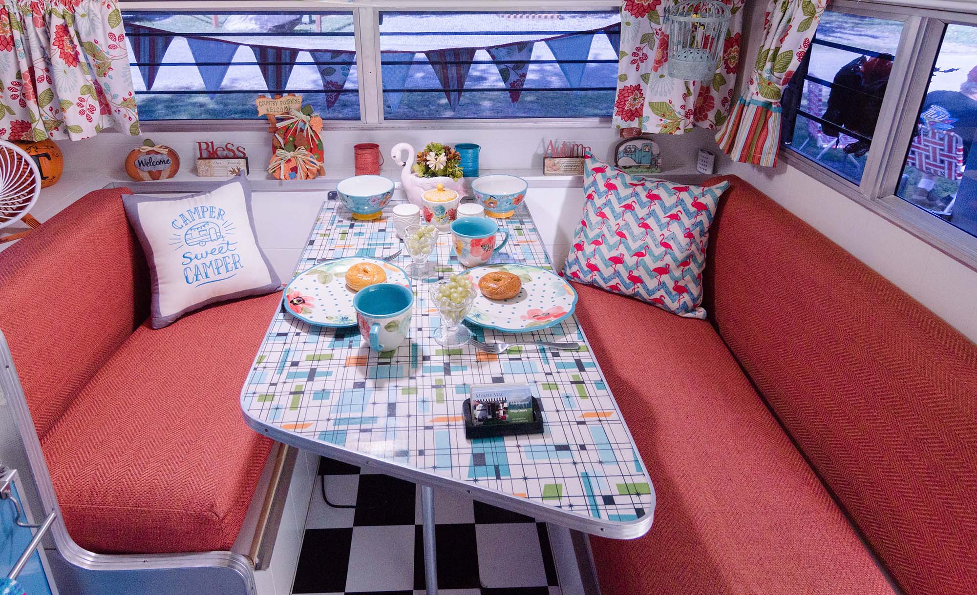 interior view of an eating area in a vintage trailer.