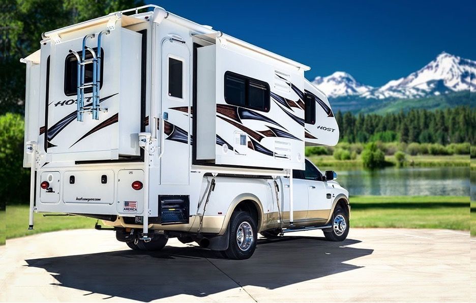 host brand mammoth camper with three slide outs